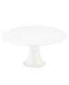 An elegant white-on-white pattern, embossed vine motif and interior glaze lend the Lenox Opal Innocence Carved cake stand to refined dining every day.