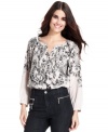 Style&co.'s blouse has a romantic feel with a floral scroll print and pintuck pleated details. (Clearance)