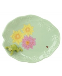 A frog figurine, embossed vines and colorful blooms plucked from the beloved Butterfly Meadow pattern make this lily-pad-green spoon rest a whimsical addition to the beloved Lenox dinnerware collection. A frog figurine, embossed vines and colorful blooms plucked from the beloved Butterfly Meadow pattern make this lily-pad-green spoon rest a whimsical addition to the beloved Lenox dinnerware collection.