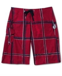 Hit the sand and surf in style with these plaid board shorts by Volcom.
