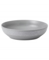 Effortlessly chic, the Simplicity pasta bowl by Vera Wang Wedgwood features a minimalist shape in casual porcelain lined with neutral cream and gray.