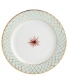 An intricate gold lattice pattern frames a single starburst in the center of this striking salad plate from Bernardaud.