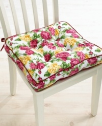 Sit pretty. This Rose Kiss seat cushion saves any less-than-cozy seat with a soft and plush design that's covered in luscious blooms. With burgundy piping and ties to keep it in place. Sit pretty. This Rose Kiss seat cushion saves any less-than-cozy seat with a soft and plush design that's covered in luscious blooms. With burgundy piping and ties to keep it in place.