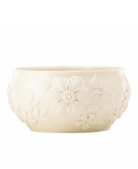 Teeming with fresh blooms in graceful ivory porcelain, the Floral Fields bowl from Lenox has a serene, understated elegance. A simple silhouette balances elaborate sculpted detail. Teeming with fresh blooms in graceful ivory porcelain, the Floral Fields bowl from Lenox has a serene, understated elegance. A simple silhouette balances elaborate sculpted detail.