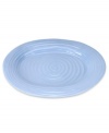 Like a blooming bed of forget-me-nots, this powder-blue porcelain serveware has a fresh, natural vibrance. A hand thrown texture gives the contemporary oval platter the irresistible charm of traditional pottery.