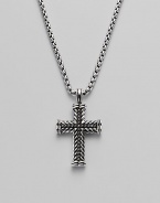 A finely detailed silver chevron cross pendant is centered with brilliant black pavé diamonds. Diamonds, 0.65 tcw Chain length 22 Imported