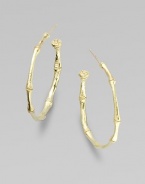 A bamboo hoop in 18K yellow gold for a subtle twist to classic design.18K gold Diameter, about 1 Post backs Made in USA 