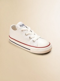 This tiny version of the signature classic will look adorable with any outfit.Lace-up closure Canvas upper Cotton canvas lining Traditional Chuck insole Rubber sole Imported This tiny version of the signature classic will look adorable with any outfit.Lace-up closure Canvas upper Cotton canvas lining Traditional Chuck insole Rubber sole Imported