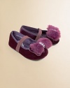 Baby's first Mary Janes are crafted in plush velvet with furry bow and elastic strap for easy on and off.Elastic strap across the vampVelvet upperSatin liningSynthetic suede solePadded insoleImported