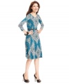Ellen Tracy's swingy frock makes an impression with a bold, paisley-inspired print and flattering silhouette. The removable belt adds a touch of dressiness, too! (Clearance)