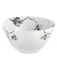 Compose a striking arrangement with the Black Orchid serving bowl by Michael Aram. Fine white Limoges porcelain flourishes under a dark watercolor motif inspired by foliage from around the world. Compose a striking arrangement with the Black Orchid serving bowl by Michael Aram. Fine white Limoges porcelain flourishes under a dark watercolor motif inspired by foliage from around the world.