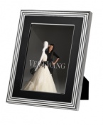 Add new elegance to beautiful memories with Vera Wang's With Love Noir picture frame. Geometric detail lends metallic shimmer to chic black enamel in a home accent that invokes modern and deco design.