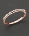 An elegant diamond ring in 14 Kt. rose gold that can be worn stacked.