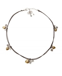A crafty design with lots of charm. This cute necklace by Fossil features a chocolate-colored leather cord with clusters of brass and silver tone heart charms and crystal accents. Lock and key charms located at lobster claw clasp. Approximate length: 18 inches. Approximate drop: 6/8 inch. A crafty design with lots of charm. This cute necklace by Fossil features a chocolate-colored leather cord with clusters of brass and silver tone heart charms and crystal accents. Lock and key charms located at lobster claw clasp. Approximate length: 18 inches. Approximate drop: 6/8 inch.