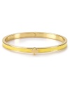 Simply styled, this bangle is just the bright touch, detailed with kate spade new york's signature.