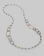 An array of links - ovals and circles, silver and gold, cabled and smooth, large and small - come together in a striking necklace that's the essence of Yurman style. Sterling silver and 18k yellow gold Length, about 37½ Lobster clasp Made in USA