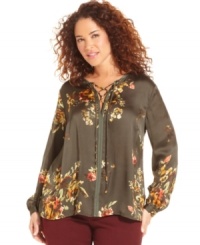 Lend a touch of romance to your style with Jones New York Signature's long sleeve plus size blouse, featuring a lace-up neckline and floral-print. Lend a touch of romance to your style with Jones New York Signature's long sleeve plus size blouse, featuring a lace-up neckline and floral-print.