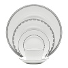 Vera Wang introduces Flirt fine bone china dinnerware. This platinum banded pattern features a modern scallop lace motif and a contemporary take on traditional lace work. Decoration on the inner verge of the accent plate, bread and butter and tea saucer adds a flirtatious touch of whimsy.