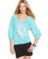 Pair INC's petite embroidered peasant top with shorts or slim capris to give any outfit a touch of exotic elegance.