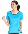Energize your workout routine with Ideology's active tee, featuring an electric color with contrasting trim and breathable mesh insets!