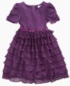 Ruffles fall down the skirt of this tiered dress from Sweet Heart Rose, giving her a flowing style she'll love to show off. (Clearance)