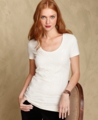 A tonal sequin design adds a glimmering touch to Tommy Hilfger's pretty top. A tonal sequin design adds a glimmering touch to Tommy Hilfger's pretty top.