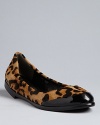Rachel Roy punctuates the pointed toe trend with unique cap toe details that update wear-daily ballet flats.
