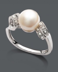 Add a twist to your look with polish and shine. Ring by Belle de Mer features an intricate setting and double loop design highlighting a cultured freshwater pearl (8-9 mm). Crafted in sterling silver with sparkling diamond accents. Size 7.