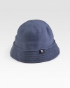 A soft cotton knit design with a bell silhouette and a ribbed brim. Hand wash Imported