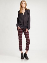 Silk-like topper has ruched shoulders, slash pockets and hits below the hips. V-neckLong sleevesSnap closuresFront slash pocketsLonger length hits below the hipsPolyesterDry cleanImportedModel shown is 5'10 (177cm) wearing US size 2. Silk-like topper has ruched shoulders, slash pockets and hits below the hips. V-neckLong sleevesSnap closuresFront slash pocketsLonger length hits below the hipsPolyesterDry cleanImportedModel shown is 5'10 (177cm) wearing US size 2.