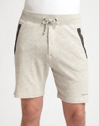 A sophisticated presence that doesn't sacrifice comfort, these cotton knit sweat shorts are sharpened by contrast detail at the pockets and signature logo detail.Drawstring waistSide slash, back welt pocketsInseam, about 6CottonMachine washImported