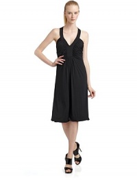 THE LOOKThick straps with crisscrossed backRuched bust Gentle drapingPullover styleTHE FITAbout 40 from shoulder to hemTHE MATERIAL88% viscose/12% elastaneCARE & ORIGINDry cleanMade in ItalyModel shown is 5'10 (177cm) wearing US size 4. THE LOOKThick straps with crisscrossed backRuched bust Gentle drapingPullover styleTHE FITAbout 40 from shoulder to hemTHE MATERIAL88% viscose/12% elastaneCARE & ORIGINDry cleanMade in ItalyModel shown is 5'10 (177cm) wearing US size 4.