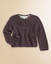 A plush, ultra-luxe, button-front knit with front bow, check lining and patch pocket.CrewneckLong sleevesButton-frontPatch pocketCashmereDry cleanImported Please note: Number of buttons may vary depending on size ordered. 