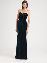 Luxurious velvet, in a striking colorblock design embellished with ornate beading on the bodice.Strapless sweetheart necklineBeaded bodiceConcealed back zipFully linedAbout 48 from natural waistRayon/silkDry cleanImportedModel shown is 5'11 (180cm) wearing US size 4.This style runs true to size. We recommend ordering your usual size for a standard fit. Luxurious velvet, in a striking colorblock design embellished with ornate beading on the bodice.Strapless sweetheart necklineBeaded bodiceConcealed back zipFully linedAbout 48 from natural waistRayon/silkDry cleanImportedModel shown is 5'11 (180cm) wearing US size 4.This style runs true to size. We recommend ordering your usual size for a standard fit.