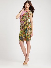 A colorful, abstract botanical pattern decorates this feminine, ruffled design.Jewel necklineCap sleevesRuffled side drapeFully linedAbout 22 from natural waistNylonDry cleanImportedModel shown is 5'10 (177cm) wearing US size Small. A colorful, abstract botanical pattern decorates this feminine, ruffled design.Jewel necklineCap sleevesRuffled side drapeFully linedAbout 22 from natural waistNylonDry cleanImportedModel shown is 5'10 (177cm) wearing US size Small.