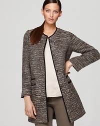 Classic tweed gets a contemporary spin as metallic threading modernizes this Bloomingdale's exclusive Gerard Darel coat. Garnish with gold accents for shameless spotlight appeal. Classic tweed gets a contemporary spin as metallic threading modernizes this Bloomingdale's exclusive Gerard Darel coat. Garnish with gold accents for shameless spotlight appeal.