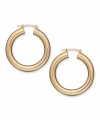 Diamond accents add the dazzle to a traditional pair of hoop earrings. Crafted in 14k gold, by Signature Gold™. Approximate diameter: 1-1/8 inches.