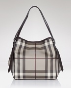 This modern tote in Burberry's iconic check makes a chic statement work or weekend.
