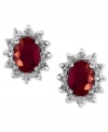 Regally red. EFFY Collection's stunning stud earrings feature oval-cut rubies (2-1/10 ct. t.w.) surrounded by halos of round-cut diamonds (1/2 ct. t.w.). Set in 14k white gold. Approximate length: 1/3 inch. Approximate width: 3/8 inch.