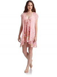THE LOOKVibrant floral printWrap front with button closureFront tie waist with back ruchingCap sleevesTHE FITAbout 35 from shoulder to hemTHE MATERIALPolyesterCARE & ORIGINMachine washImported THE LOOKVibrant floral printWrap front with button closureFront tie waist with back ruchingCap sleevesTHE FITAbout 35 from shoulder to hemTHE MATERIALPolyesterCARE & ORIGINMachine washImported