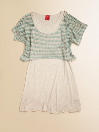A simple jersey frock is topped with a fishnet knit for a fashionable 2-in-1 look.ScoopneckShort sleevesPullover style95% rayon/5% spandexHand washMade in USA A simple jersey frock is topped with a fishnet knit for a fashionable 2-in-1 look.ScoopneckShort sleevesPullover style95% rayon/5% spandexHand washMade in USA
