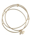 Better together, this Alex and Ani bangle set adds beautiful depth to your bracelet stack, simply crafted of plated metal.