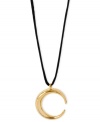 Ask for the moon. The crescent pendant from Robert Lee Morris, crafted from gold-tone mixed metal and featuring a black necklace cord, lights up the night. Approximate length: 34 inches. Approximate drop: 1-1/2 inches.