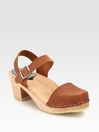 Leather staple rejuvenated by an adjustable Mary Jane strap, rubber sole and secure slingback. Wooden heel, 2½ (65mm)Wooden platform, 1 (25mm)Compares to a 1½ heel (40mm)Leather upperWooden liningRubber soleImportedOUR FIT MODEL RECOMMENDS ordering true size. Leather staple rejuvenated by an adjustable Mary Jane strap, rubber sole and secure slingback. Wooden heel, 2½ (65mm)Wooden platform, 1 (25mm)Compares to a 1½ heel (40mm)Leather upperWooden liningRubber soleImportedOUR FIT MODEL RECOMMENDS ordering true size.