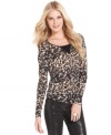 An allover leopard print adds fierce flair to this Kensie top for a fashion-forward look!