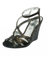 Turn heads with the edgy elegance of the Dove In sandals by Kenneth Cole Reaction. Sexy snake print and a wedge heel are guaranteed to catch eyes. Turn heads with the edgy elegance of the Dove In sandals by Kenneth Cole Reaction. Sexy snake print and a wedge heel are guaranteed to catch eyes.