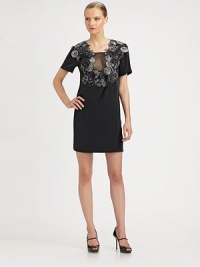 This simple silk silhouette is embellished with a generous swath of floral fabric around the entire neckline.Plunging U necklineSheer illusion panelFloral embroidered appliquéShort sleevesAbout 19½ from natural waistSilkDry cleanMade in USA of imported fabricModel shown is 5'9 (175cm) wearing US size 4. This simple silk silhouette is embellished with a generous swath of floral fabric around the entire neckline.Plunging U necklineSheer illusion panelFloral embroidered appliquéShort sleevesAbout 19½ from natural waistSilkDry cleanMade in USA of imported fabricModel shown is 5'9 (175cm) wearing US size 4.