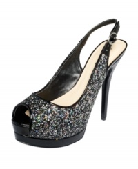 Sparkled sling-backs never looked so good. GUESS's Glenesia platform pumps are made of rock candy glitter and are sure to add glitz and glamour to your most beautiful nights. Sparkled sling-backs never looked so good. GUESS's Glenesia platform pumps are made of rock candy glitter and are sure to add glitz and glamour to your most beautiful nights.