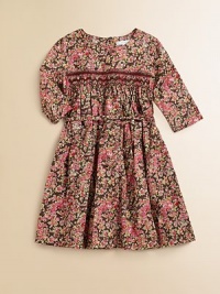Blooming with brilliant flowers, this sweet cotton frock features a smocked bodice and and cinched waist with ribbon tie.Round necklineLong sleevesBack buttonsSmocked, gathered bodiceWaistband with ribbon tieFull, gathered skirtCottonMachine washImported Please note: Number of buttons may vary depending on size ordered. Blooming with brilliant flowers, this sweet cotton frock features a smocked bodice and and cinched waist with ribbon tie.Round necklineLong sleevesBack buttonsSmocked, gathered bodiceWaistband with ribbon tieFull, gathered skirtCottonMachine washImported Please note: Number of buttons may vary depending on size ordered.