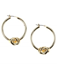 Tie your look together. These classy hoop earrings from AK Anne Klein add a twist with chic knot detail. Crafted in gold tone mixed metal. Approximate diameter: 1 inches. Tie your look together. These classy hoop earrings from AK Anne Klein add a twist with chic knot detail. Crafted in gold tone mixed metal. Approximate diameter: 1 inches.